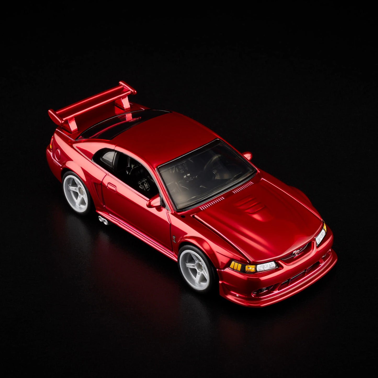 1:64 Hot Wheels RLC 2000 Ford Mustang SVT Cobra R Spectraflame bright red with opening hood.