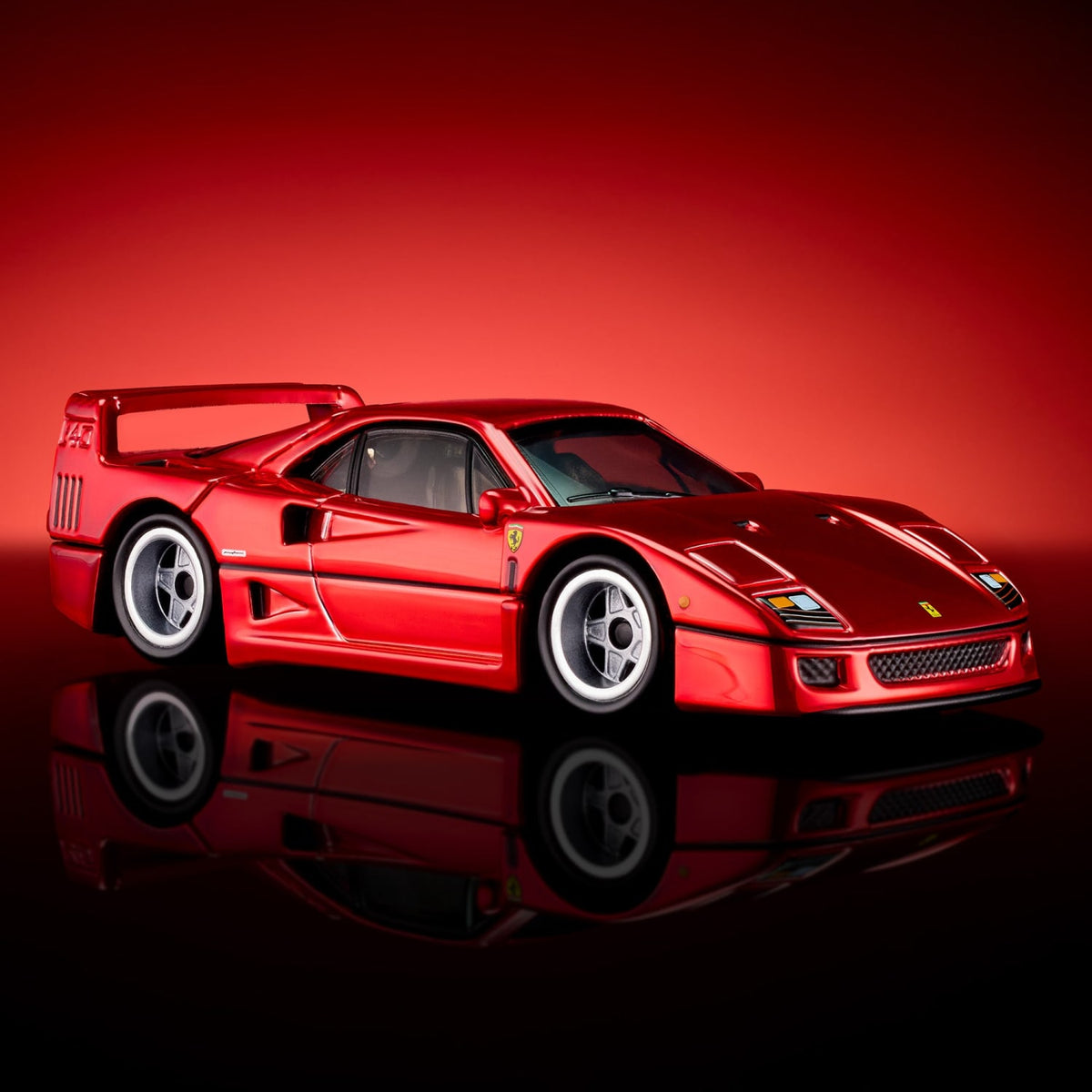 Hot Wheels RLC Ferrari F40 in bright red Spectraflame over silver plate with opening bonnet, rear clamshell and detailed engine.