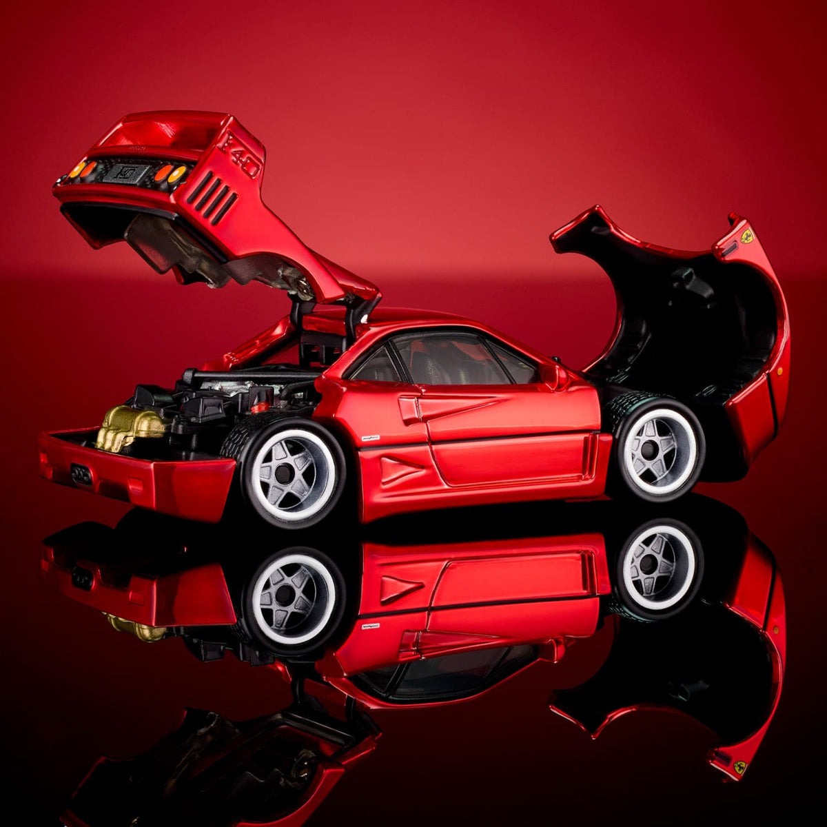Hot Wheels RLC Ferrari F40 in bright red Spectraflame over silver plate with opening bonnet, rear clamshell and detailed engine.