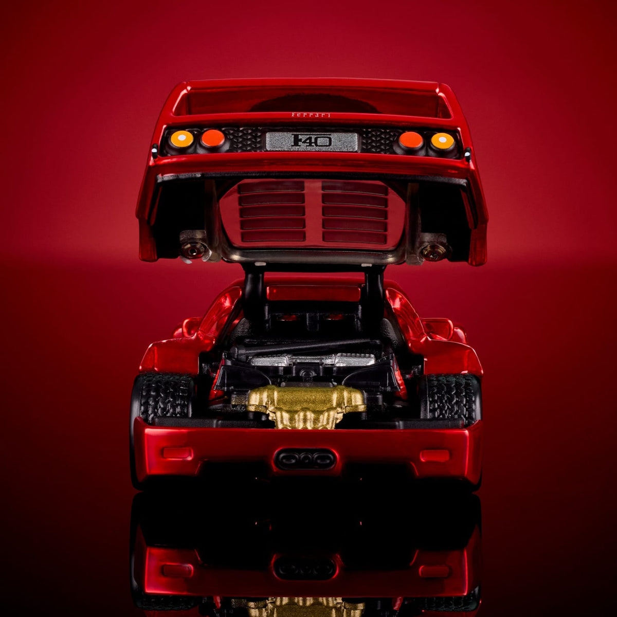 Hot Wheels RLC Ferrari F40 in bright red Spectraflame over silver plate with opening bonnet, rear clamshell and detailed engine.