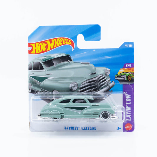 Hot Wheels 1:64 ’47 Chevy Fleetline pale green classic American cruiser die-cast model.