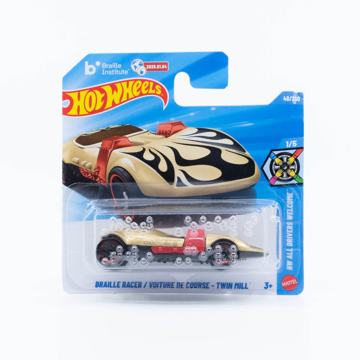 Hot Wheels 1:64 Braille Racer Twin Mill pale gold with black flames and tactile Braille details.