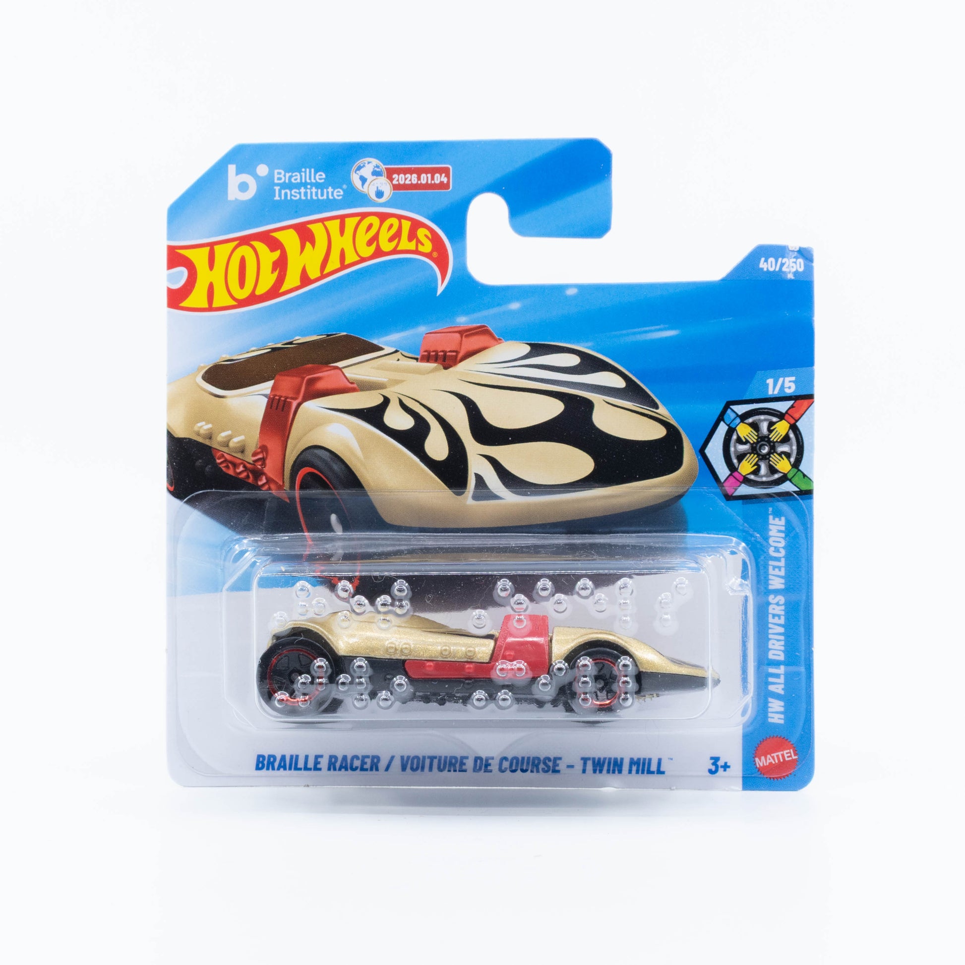 Hot Wheels 1:64 Braille Racer Twin Mill pale gold with black flames and tactile Braille details.