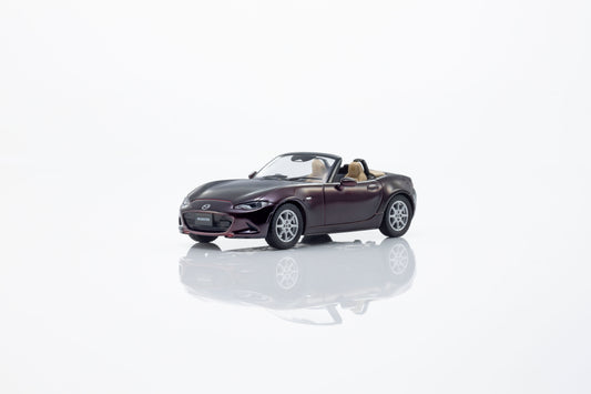 Kyosho 1:64 Mazda Roadster 35th Anniversary red convertible diecast model. Front