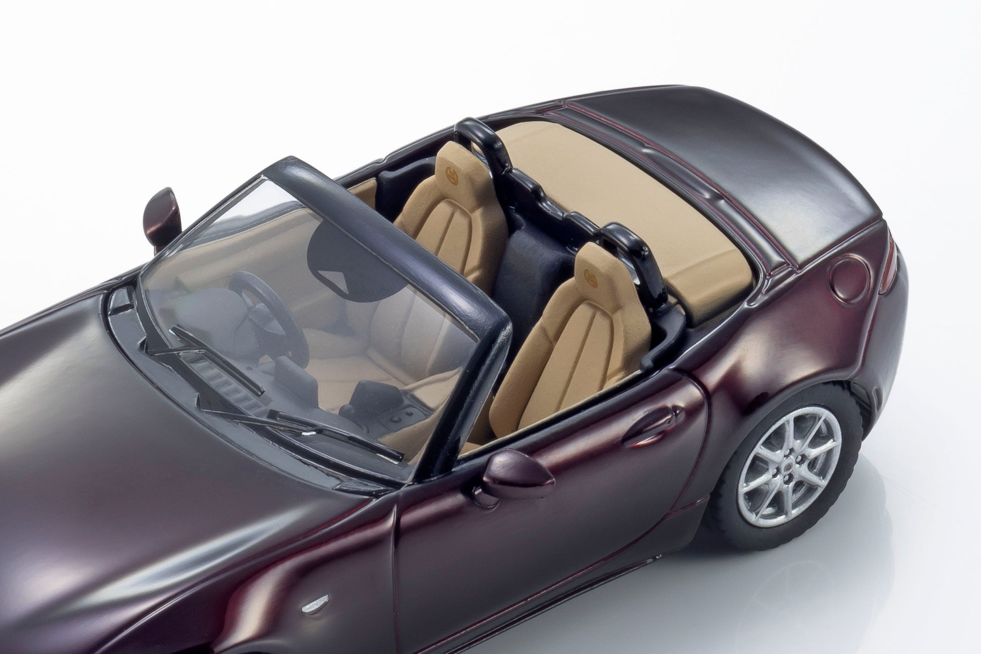 Kyosho 1:64 Mazda Roadster 35th Anniversary red convertible diecast model. Interior