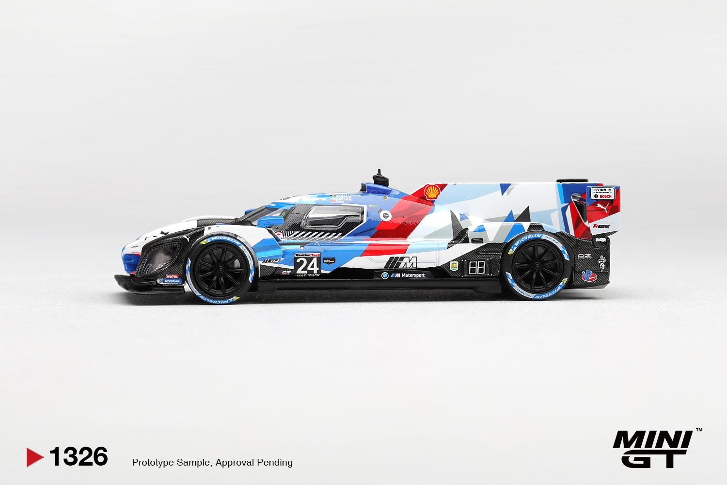 Mini GT BMW M Hybrid V8 GTP #24 BMW M Team RLL from the 2024 Rolex 24 at Daytona. Side