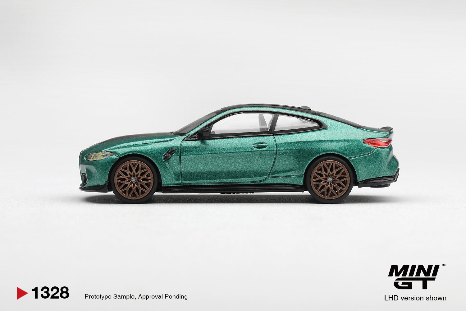 Mini GT BMW M4 CS G82 in Frozen Isle of Man Green Metallic. Side