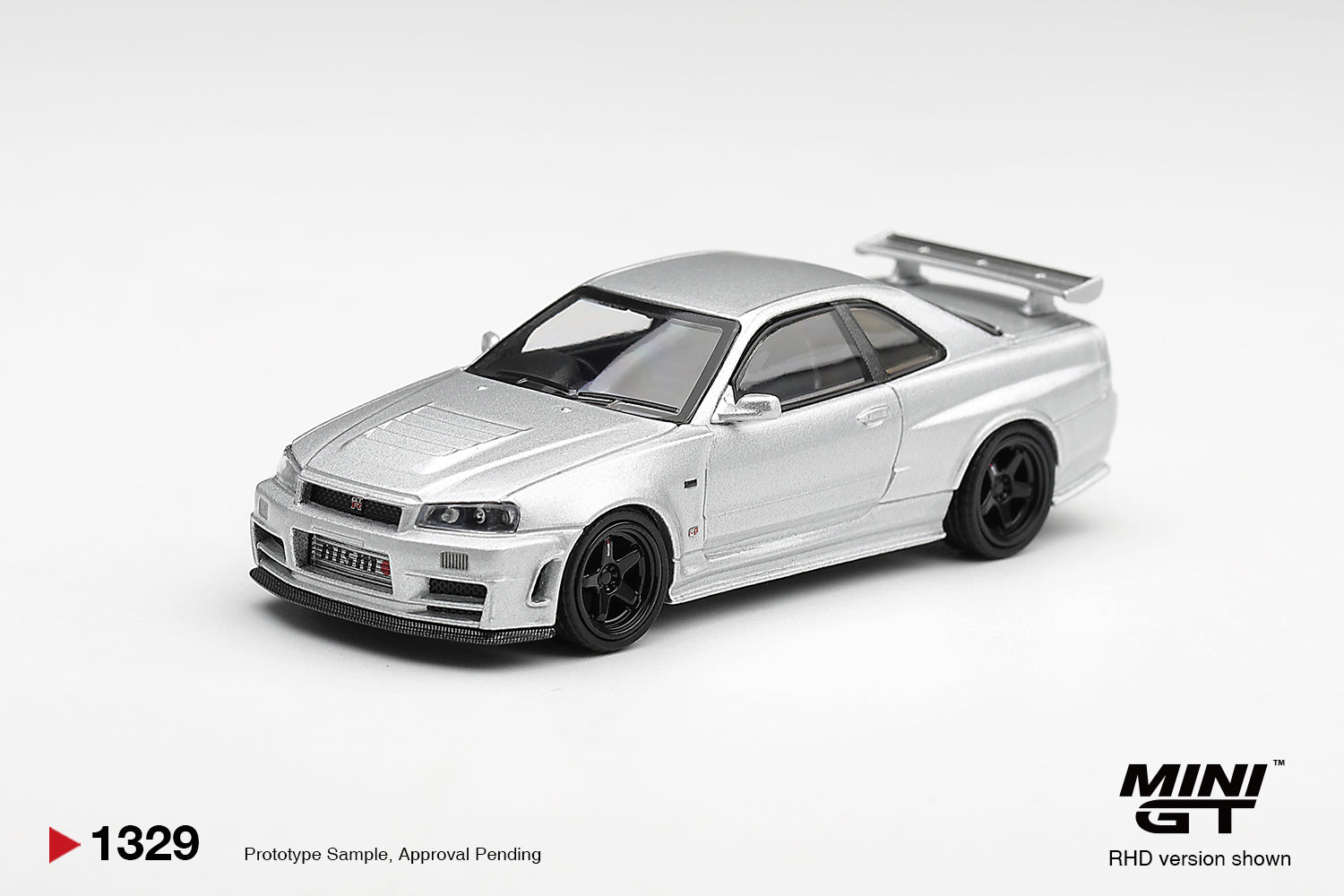 Mini GT Nissan Skyline GT-R R34 Z-Tune in Silver Metallic. Front