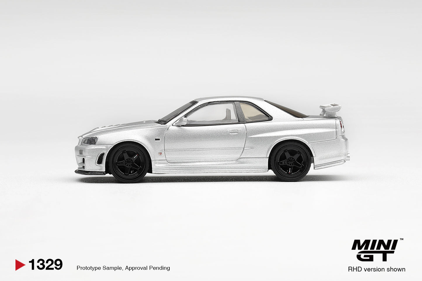 Mini GT Nissan Skyline GT-R R34 Z-Tune in Silver Metallic. Side