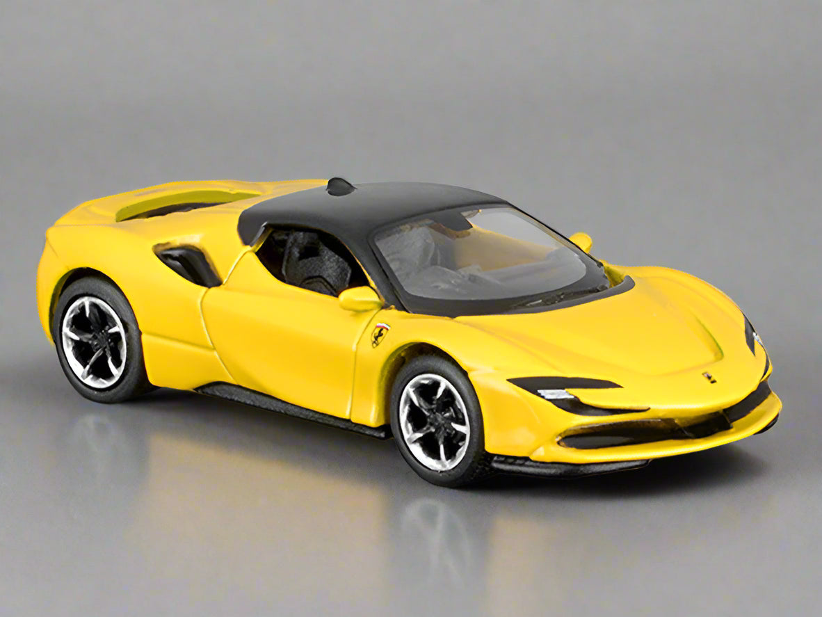 Yellow Ferrari model car on a white background