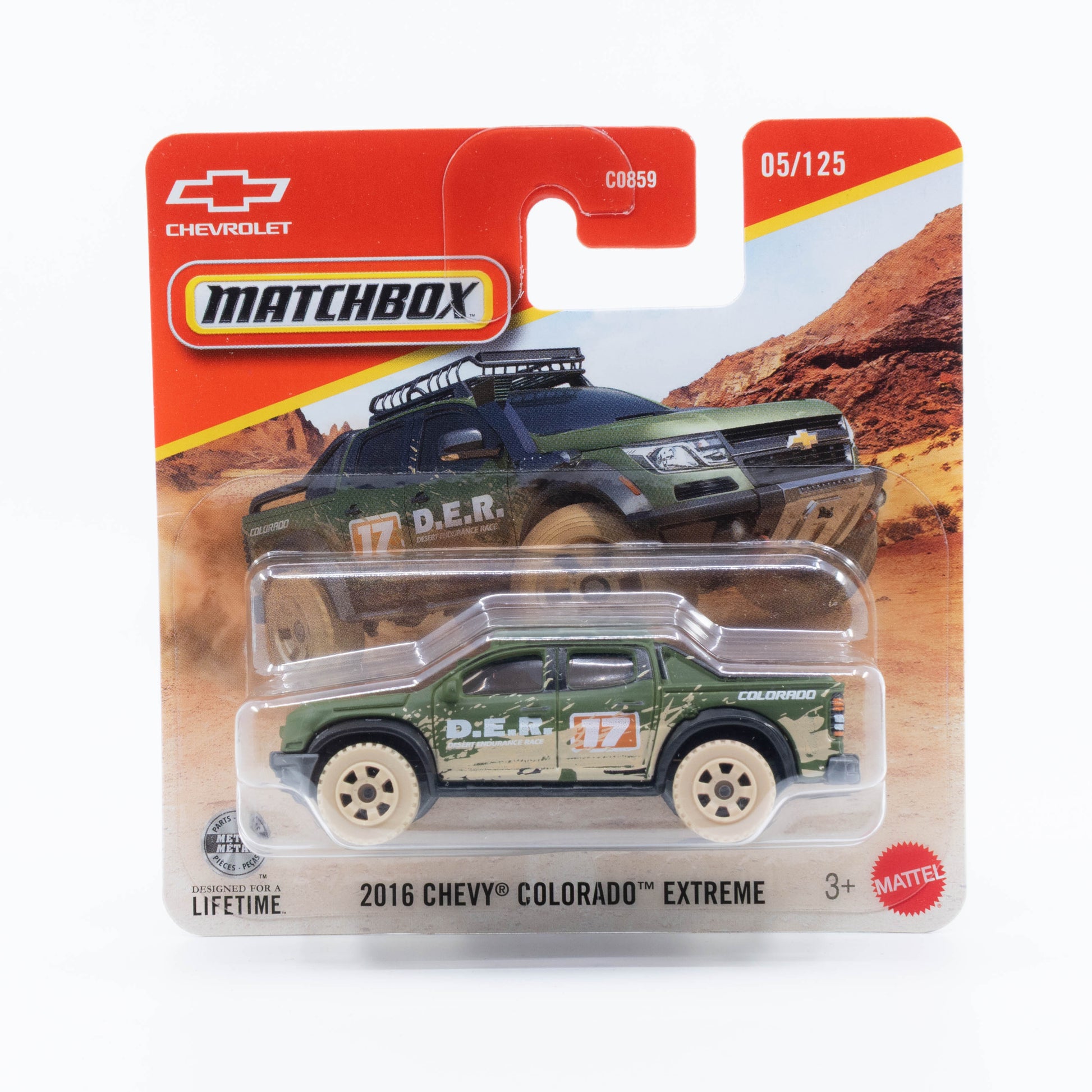 Matchbox 1:64 2016 Chevy Colorado Extreme dark green off-road pickup with dirt and sand side details.