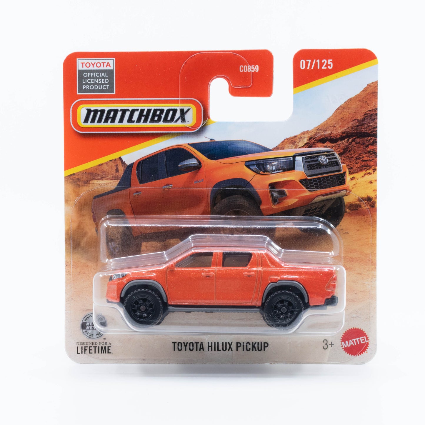 Matchbox 1:64 Toyota Hilux Pickup orange realistic utility pickup die-cast model.