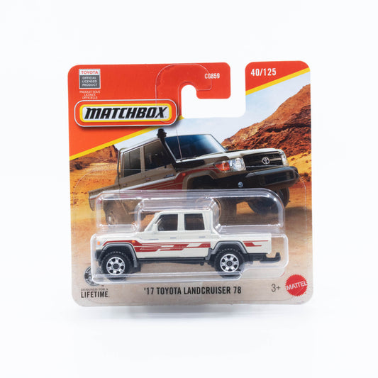 Matchbox basic ’17 Toyota Land Cruiser 78 cream off-road SUV with red accents 1:64 model