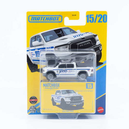 Matchbox Collectors 2020 Ram Rebel diecast truck model in 1:64 scale with NYPD police livery in white and blue