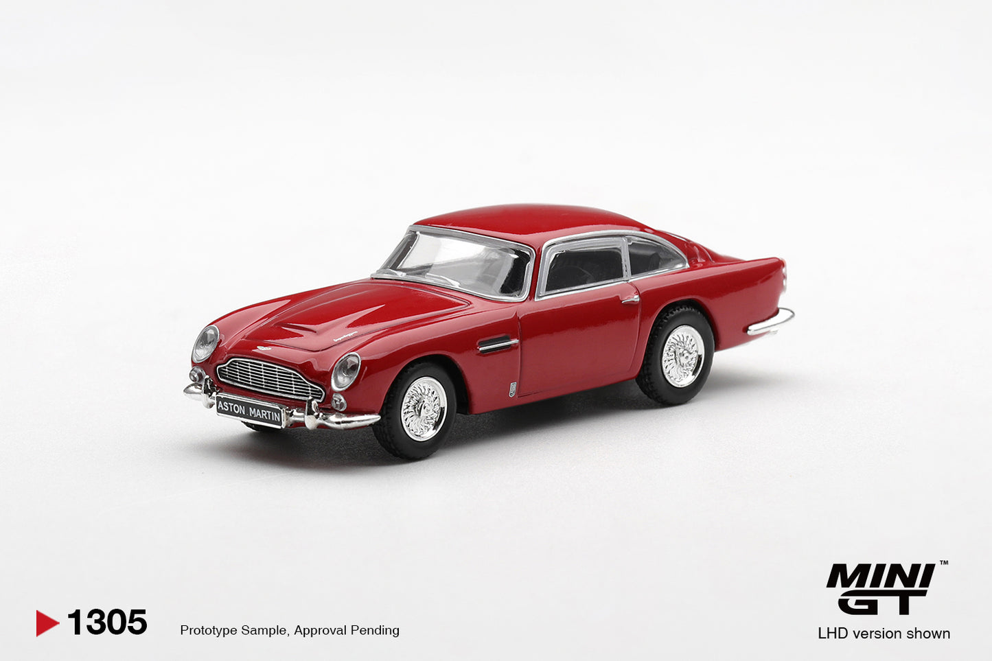 Mini GT Aston Martin DB5 Fiesta Red 1965 1:64 diecast car. Front