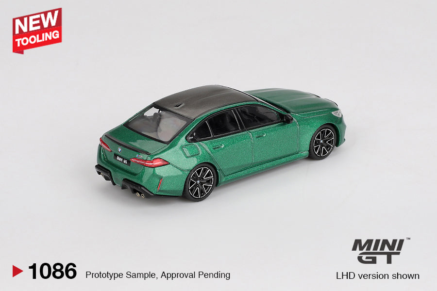 Mini GT BMW M5 G90 diecast in Isle of Man Green Metallic, 1:64 scale with detailed trim and aggressive styling. Back