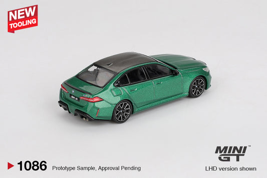 Mini GT BMW M5 G90 diecast in Isle of Man Green Metallic, 1:64 scale with detailed trim and aggressive styling. Back