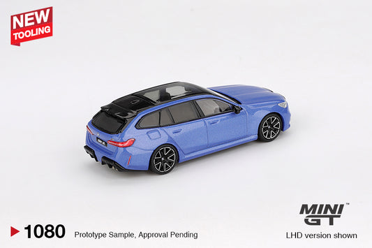 Mini GT BMW M5 (G99) Touring in metallic Marina Bay Blue, 1:64 scale diecast model. Back