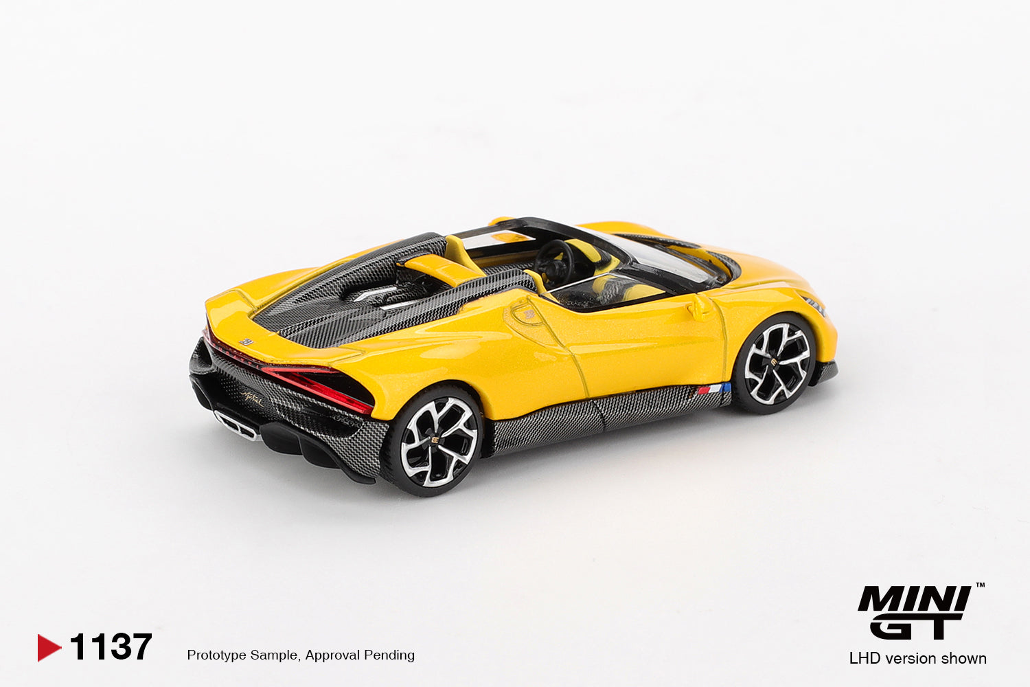 Mini GT 1:64 Bugatti W16 Mistral yellow 2023 open-top hypercar model. Back