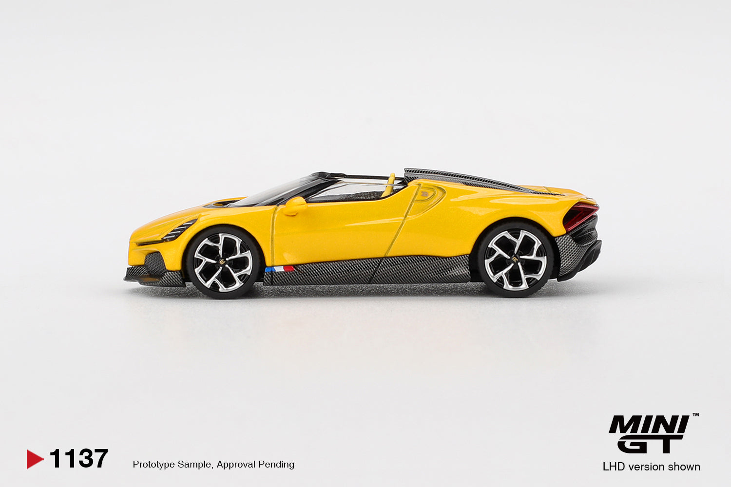 Mini GT 1:64 Bugatti W16 Mistral yellow 2023 open-top hypercar model. Side