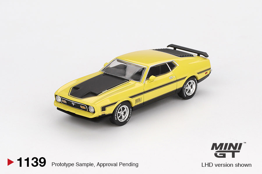 Mini GT 1:64 Ford Mustang Mach 1 1971 in Grabber Yellow with black stripes, detailed hood scoop, and classic fastback body style. Front