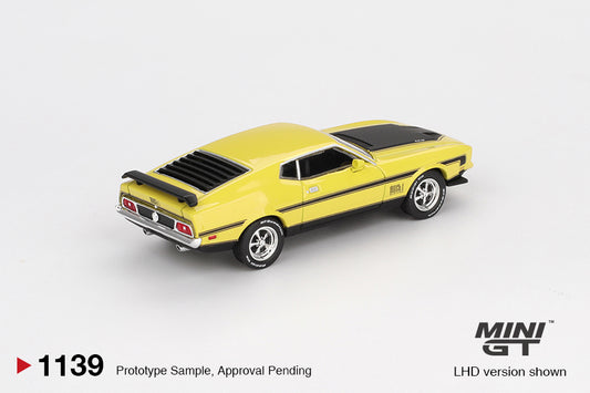 Mini GT 1:64 Ford Mustang Mach 1 1971 in Grabber Yellow with black stripes, detailed hood scoop, and classic fastback body style. Back