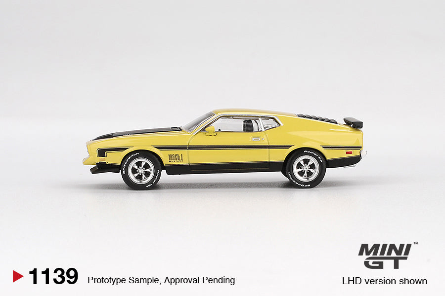 Mini GT 1:64 Ford Mustang Mach 1 1971 in Grabber Yellow with black stripes, detailed hood scoop, and classic fastback body style. Side