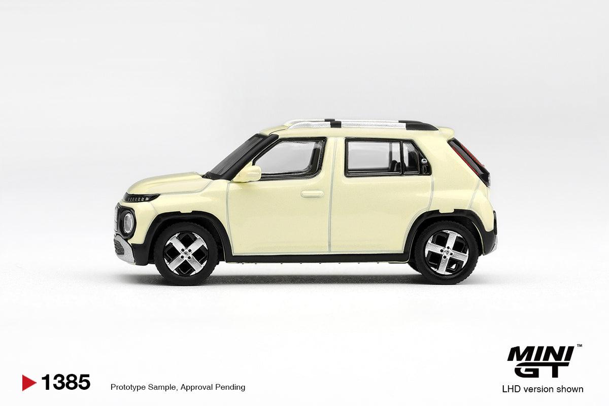 Mini GT Hyundai Casper in Butter Cream Yellow Pearl, detailed 1:64 scale city car.