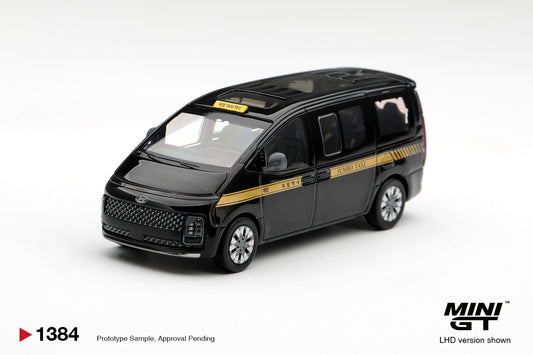 Mini GT Hyundai Staria Taxi in detailed 1:64 scale.