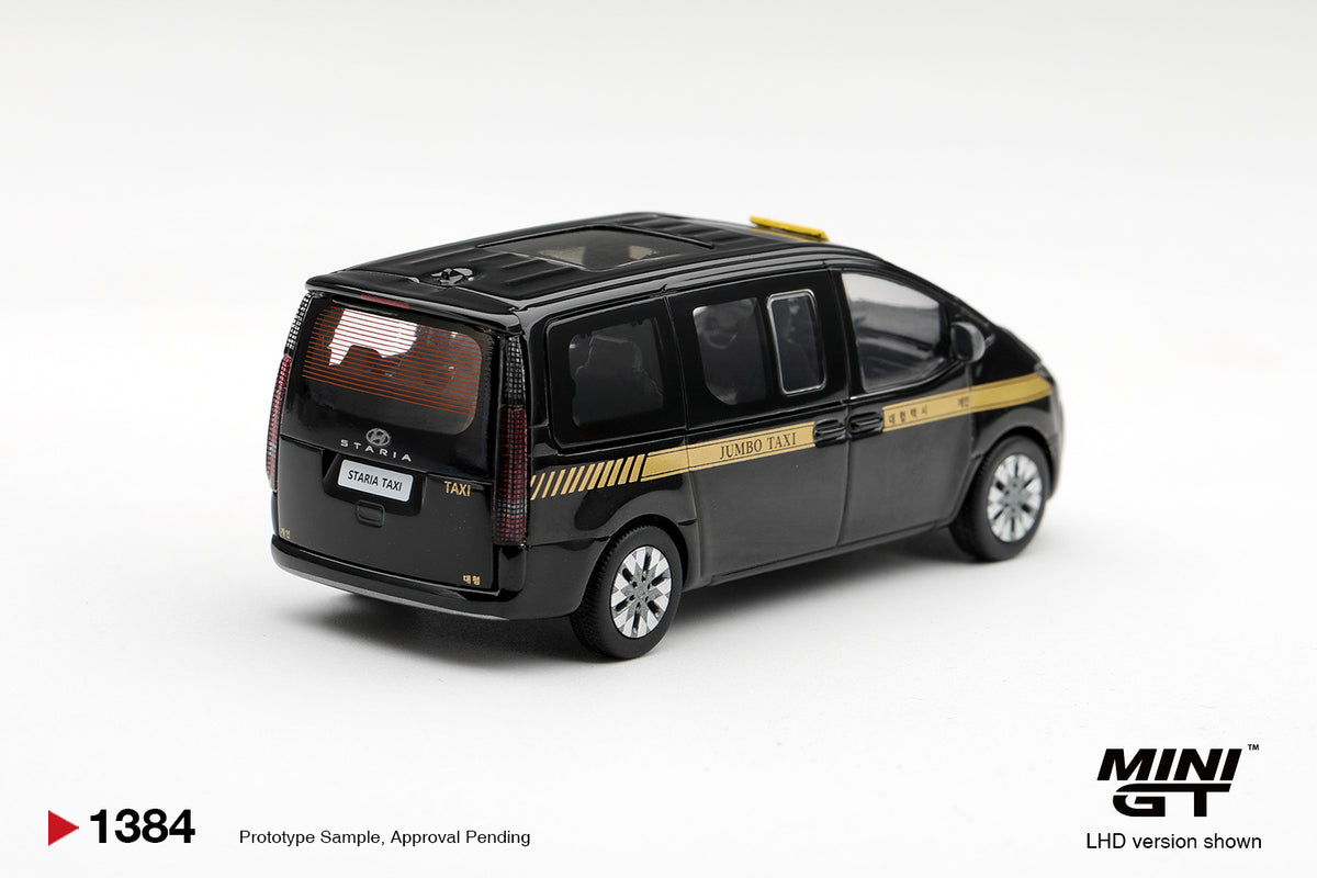 Mini GT Hyundai Staria Taxi in detailed 1:64 scale.