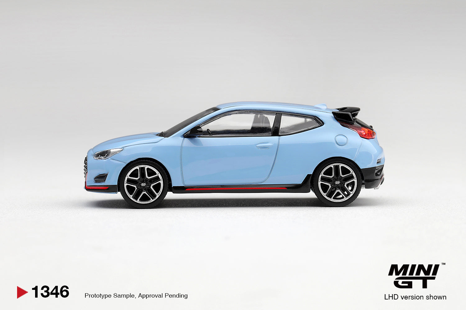 Mini GT Hyundai Veloster N in Performance Blue.