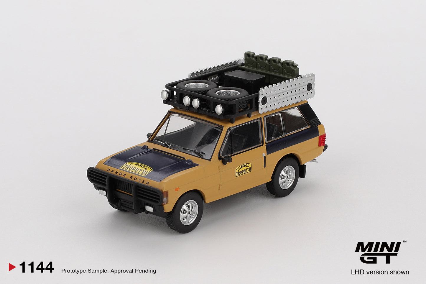 1:64 Mini GT Land Rover Range Rover Camel Trophy 1981 Winner – yellow die-cast off-road model. Front