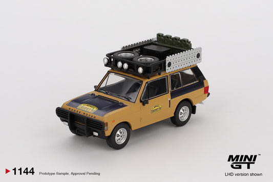 1:64 Mini GT Land Rover Range Rover Camel Trophy 1981 Winner – yellow die-cast off-road model. Front