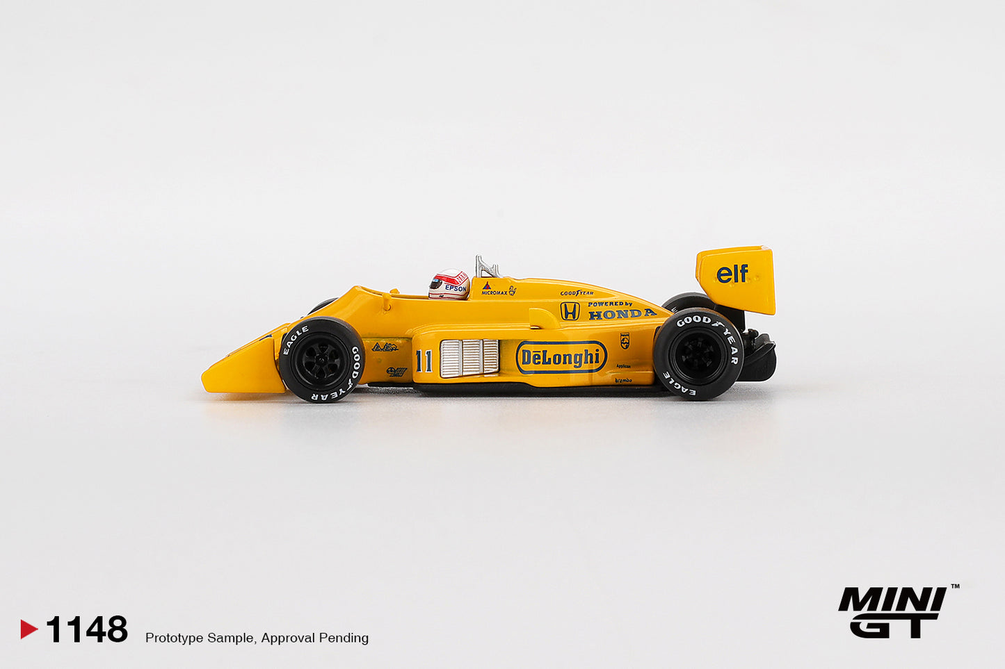1:64 Mini GT Lotus 99T #11 Satoru Nakajima Monaco F1 GP 1987 – yellow Camel livery die-cast model. Side