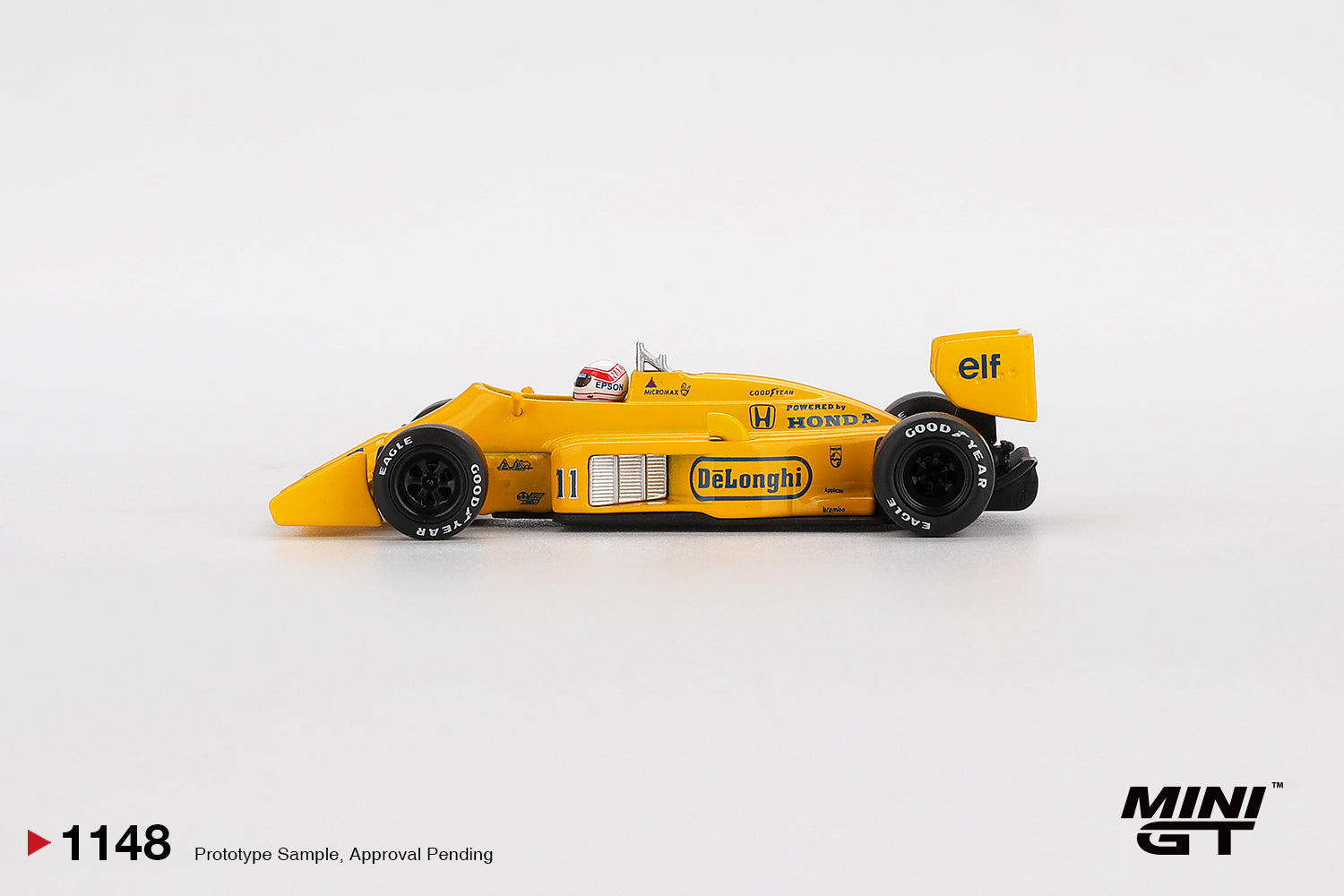 1:64 Mini GT Lotus 99T #11 Satoru Nakajima Monaco F1 GP 1987 – yellow Camel livery die-cast model. Side