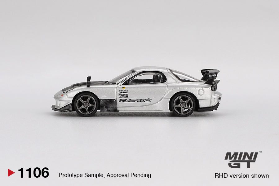 Mini GT Mazda RX-7 FD3S RE-Amemiya 2004 in Silver Metallic, 1:64 diecast model featuring widebody kit, detailed wheels, and aerodynamic design. Side