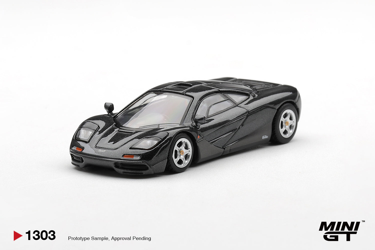 Mini GT McLaren F1 Blue Black Metallic 1993 1:64 diecast car. Front