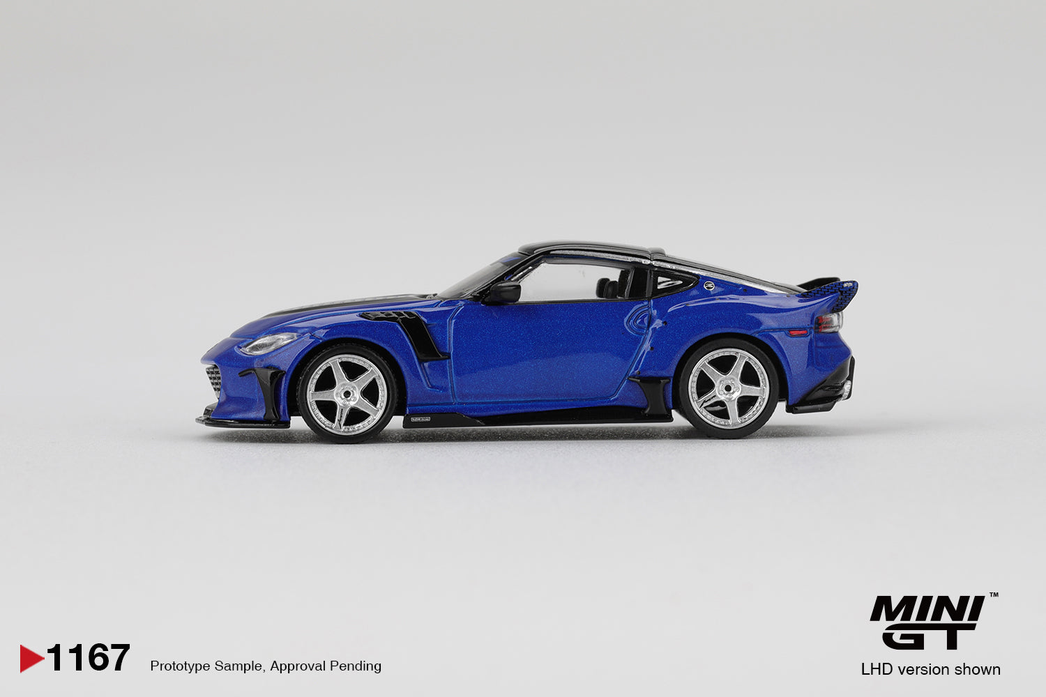 1:64 Mini GT Nissan Fairlady Z VeilSide FFZ400 Seiran Blue 2024 – widebody die-cast sports car model. Side