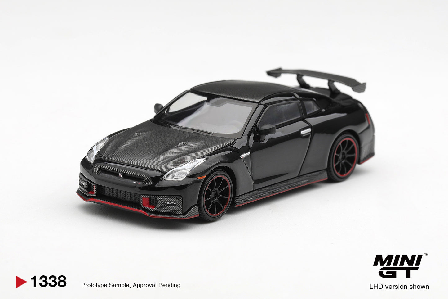 Mini GT Nissan GT-R R35 Nismo 2024 in black.