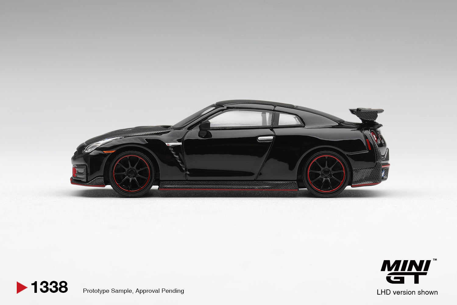 Mini GT Nissan GT-R R35 Nismo 2024 in black.