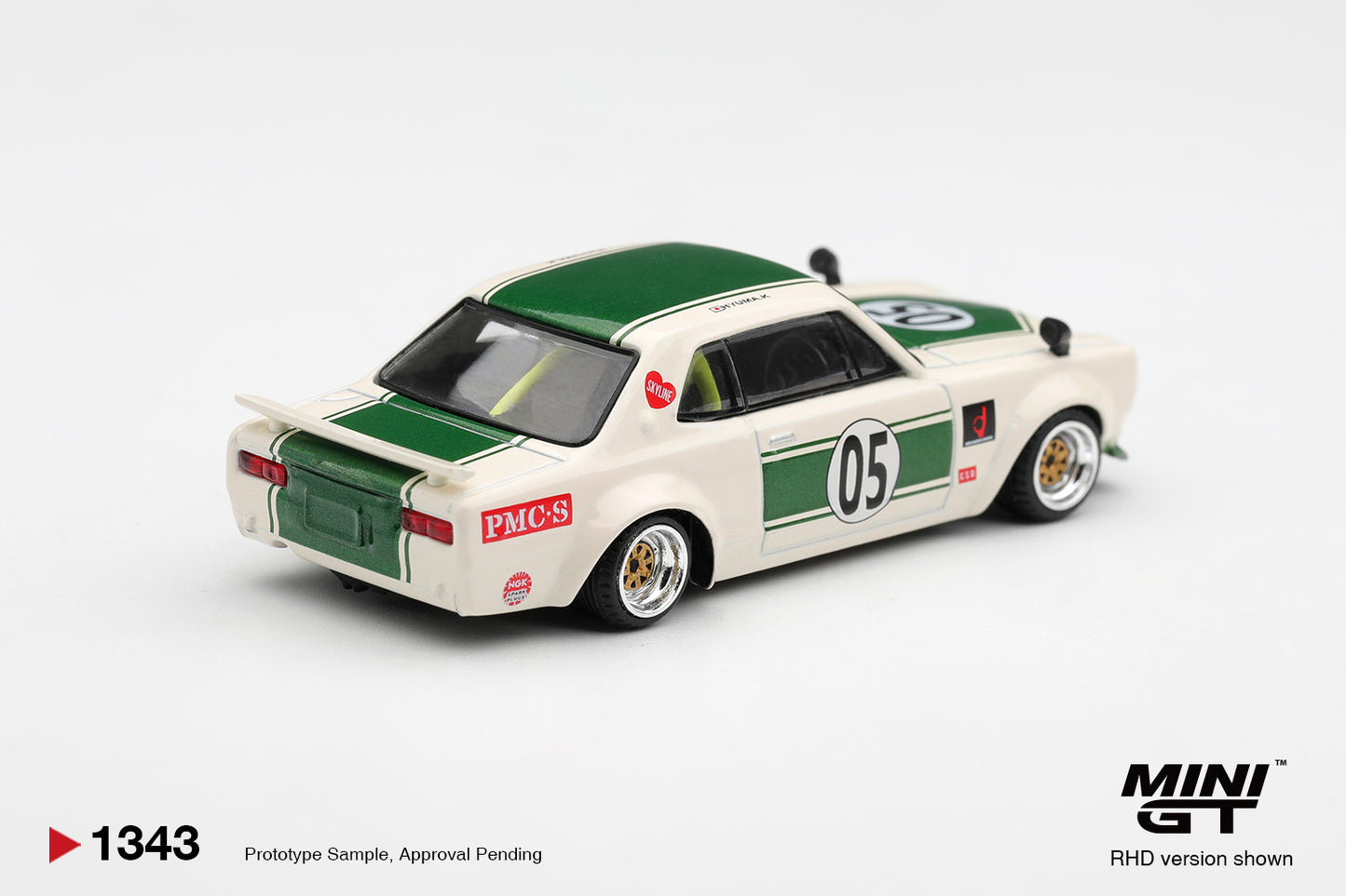 Mini GT Nissan Skyline GT-R Hakosuka LB-Works in white and green.
