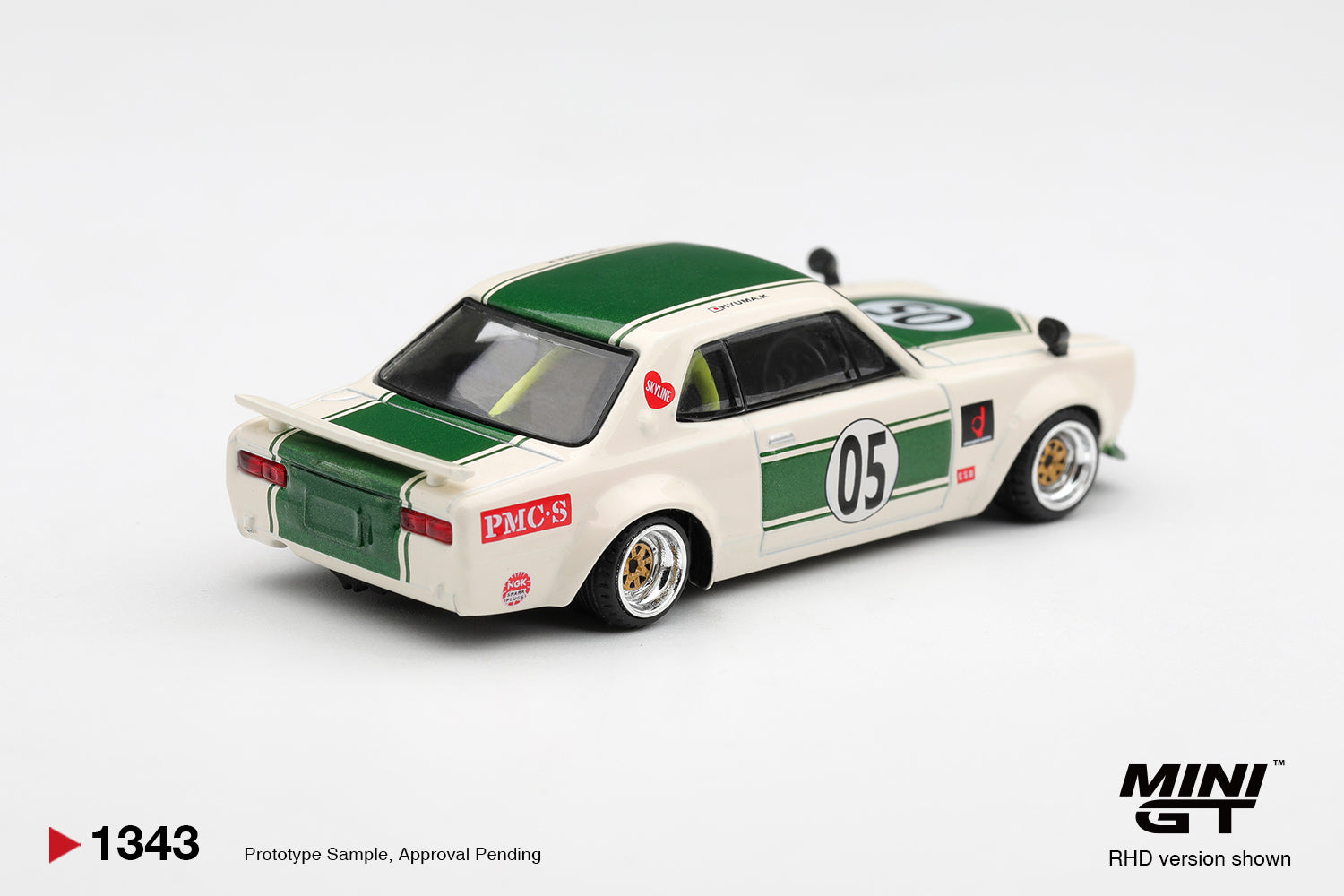 Mini GT Nissan Skyline GT-R Hakosuka LB-Works in white and green.
