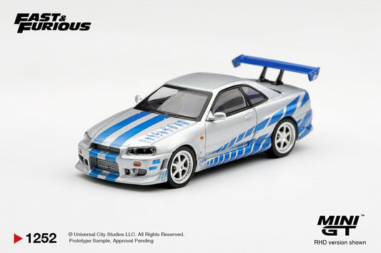 Mini GT Nissan Skyline GT-R R34 CWest from 2 Fast 2 Furious driven by Brian O'Conner, 1:64 scale.