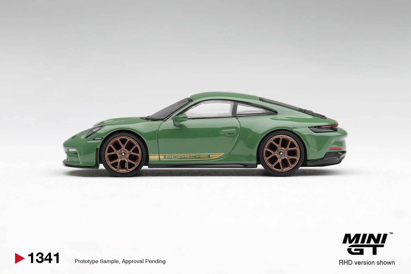 Mini GT Porsche 911 GT3 Touring (992) in Auratium Green.