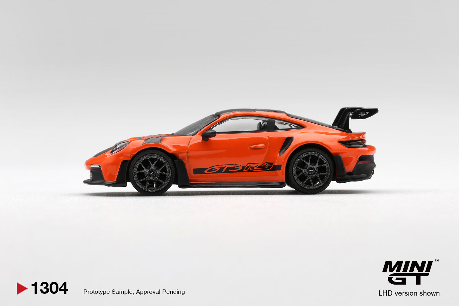 Mini GT Porsche 911 992 GT3 RS Gulf Orange Weissach Package 1:64. Side