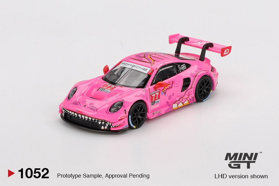 Mini GT 1:64 Porsche 911 GT3 R #77 AO Racing Road America 2024 with colorful livery and racing details. Front