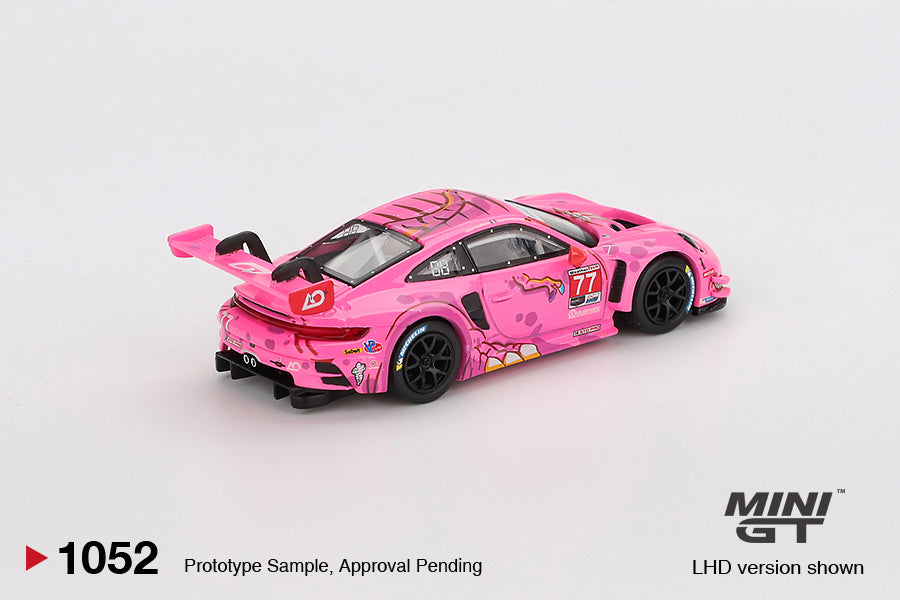 Mini GT 1:64 Porsche 911 GT3 R #77 AO Racing Road America 2024 with colorful livery and racing details. Back