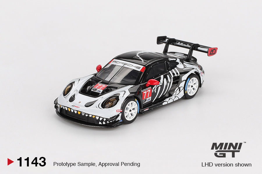 Mini GT Porsche 911 (992) GT3 R #77 AO Racing “Skeleton Rexy” livery, 1:64 scale detailed die-cast model. Front
