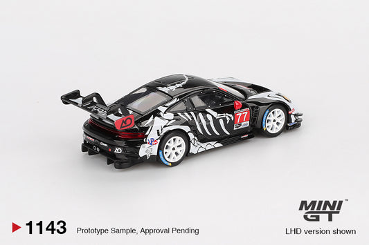 Mini GT Porsche 911 (992) GT3 R #77 AO Racing “Skeleton Rexy” livery, 1:64 scale detailed die-cast model. Back