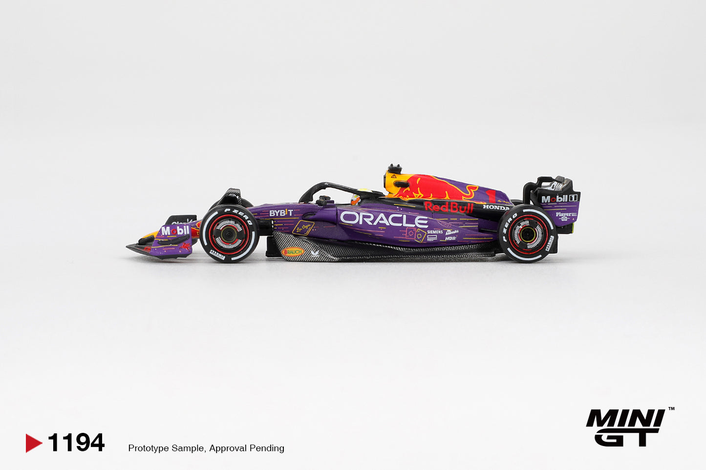 Mini GT Red Bull Racing RB19 #1 Max Verstappen Las Vegas Grand Prix 2023 winner diecast 1:64. Side